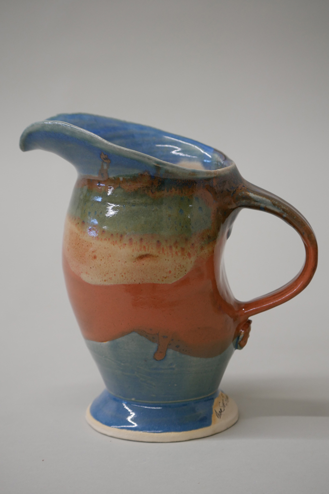 <p style="font-size: 16px; line-height: 150%;"><strong>Stoneware Aracari Pitcher</strong></p>