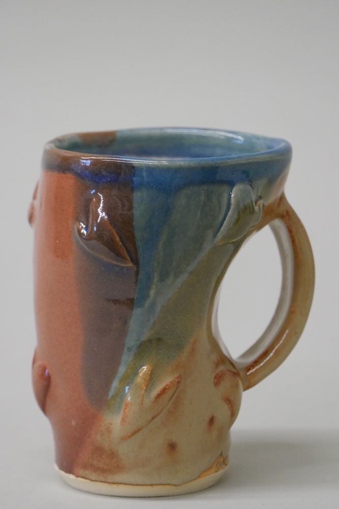 <p style="font-size: 16px; line-height: 150%;"><strong>Stoneware Altered Mug</strong></p>